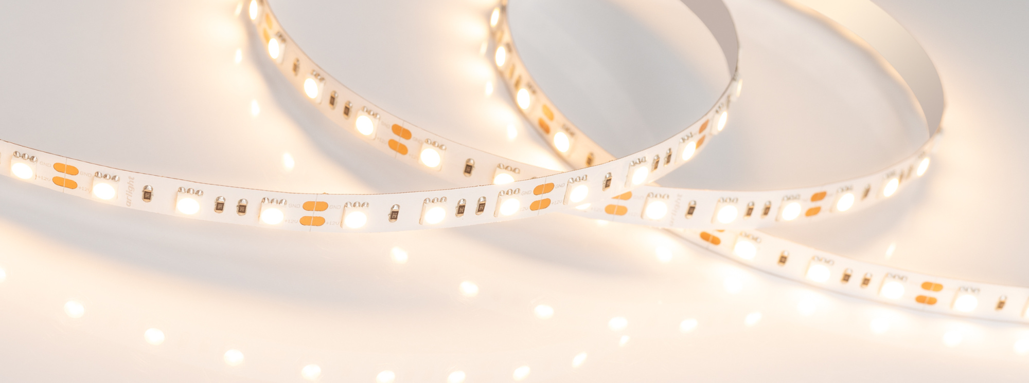 Лента RT 2-5000 12V Warm2400 2x (5060, 300 LED, LUX) (Arlight, 14.4 Вт/м, IP20)