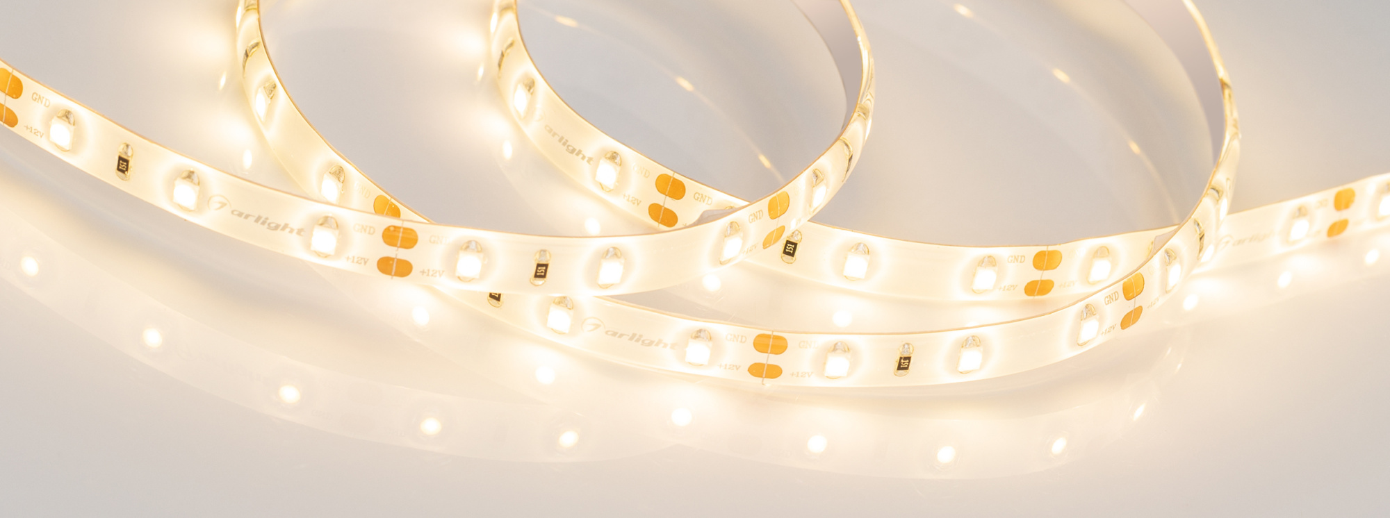 Лента RTW 2-5000SE 12V Warm (3528, 300 LED, LUX) (Arlight, 4.8 Вт/м, IP65)