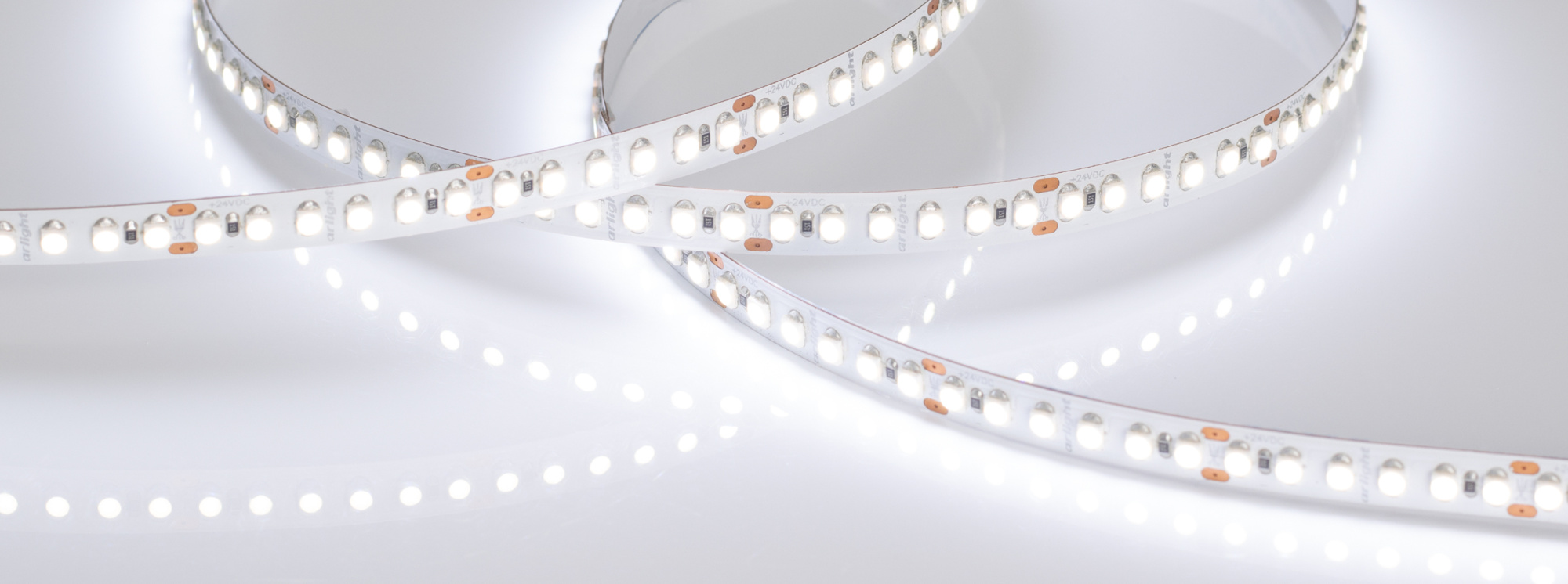 Лента RT6-3528-180 24V White6000 3x (900 LED) (Arlight, 14.4 Вт/м, IP20)