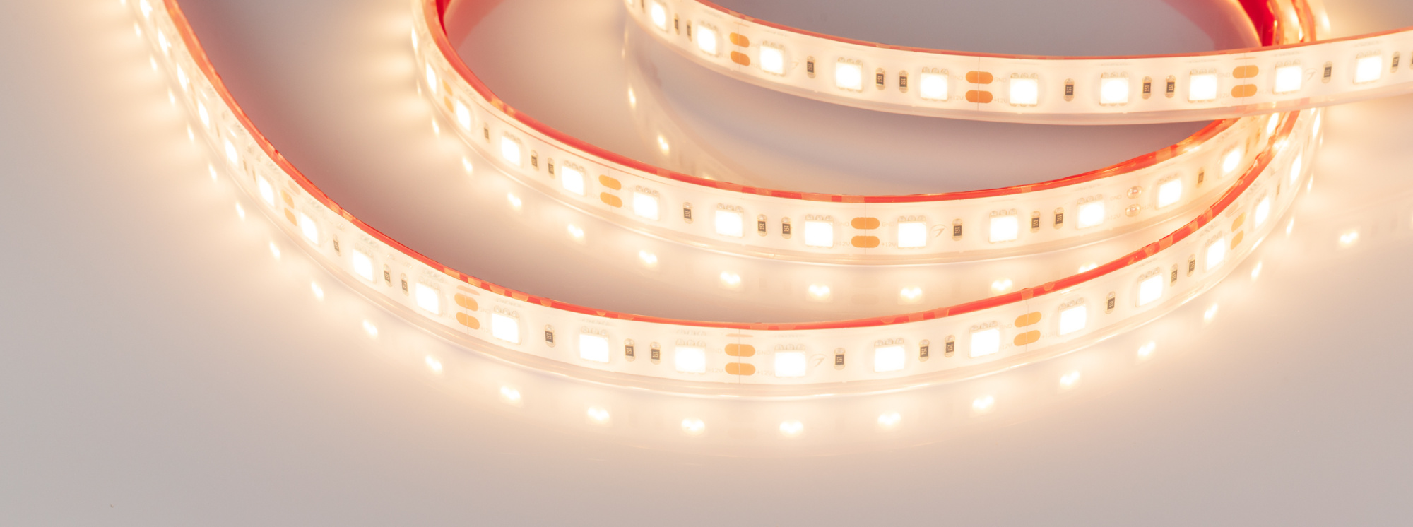 Лента RTW 2-5000PGS 12V Warm 2x (5060, 300 LED, LUX) (Arlight, 14.4 Вт/м, IP67)